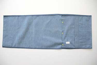 Fold pocket in place for newspaper