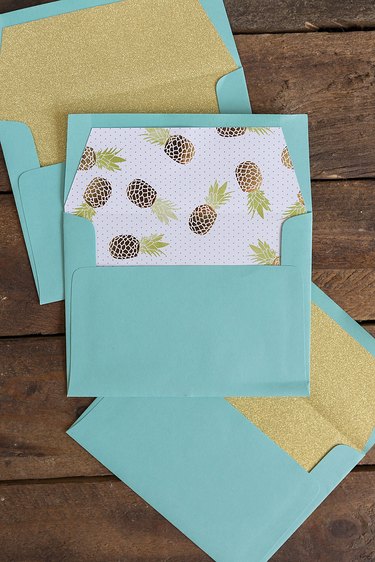Three finished envelope liners.