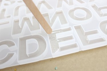 pour resin into the mold