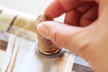 Press DIY wax seal stamp into hot wax