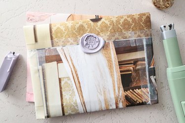 Upcycled magazine envelopes with wax seal stamps