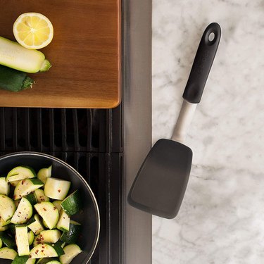 DI ORO Chef Series Standard Flexible Silicone Turner on a marble countertop