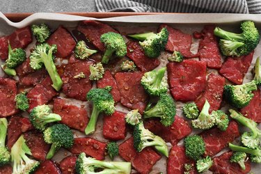 Broccoli and beef on a baking sheet
