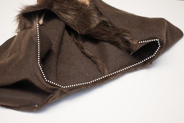 Sew the cape and hood together.