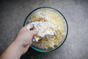 Coat the cheese well with the cornstarch.