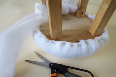 Secure and trim the batting layer.