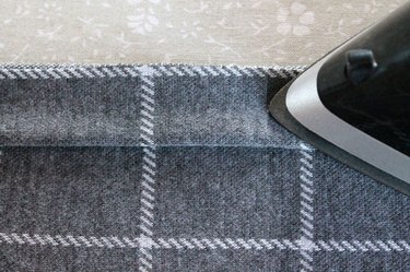 Press the accordion fold hem with an iron.