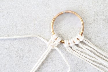 Pull the cords to tighten
