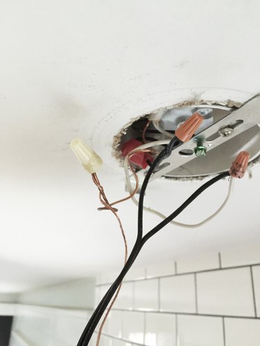 Place wire connectors on the end of the copper wires.