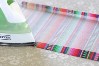 Adorn the interior of your car with a colorful, handmade steering wheel cover.