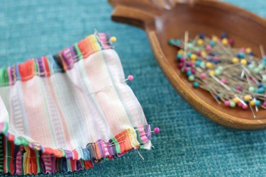Adorn the interior of your car with a colorful, handmade steering wheel cover.