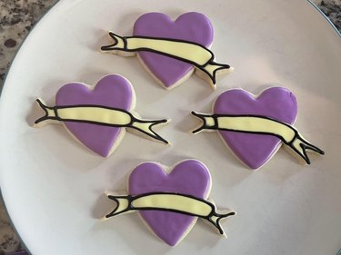 Purple heart-shaped cookies air-drying