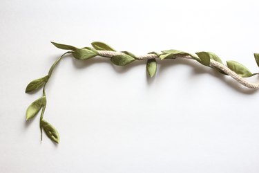 Wrap leaf ribbon around rope.