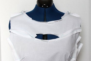 Put muslin on the dress form inside out.