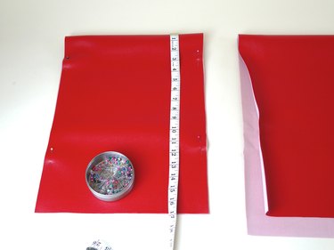 Folded piece of vinyl measured and cut to the proper measurements.