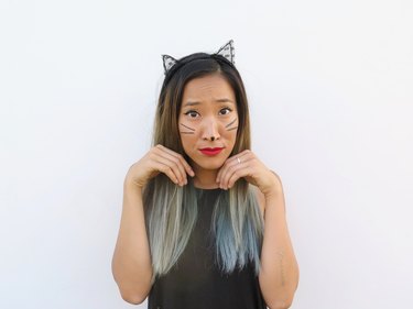 Wearing the lace cat ears.
