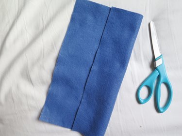 Folding one side of the felt 2.5-in inward for a pencil case