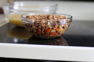 Bowl of vegetables and breakfast sausage