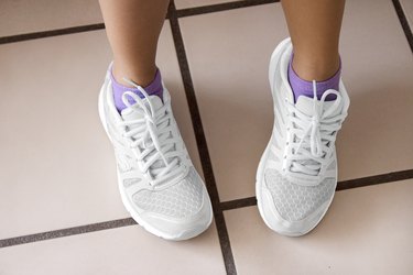 White shoes match the tulle outfit.
