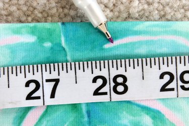 Sewing ruler on fabric