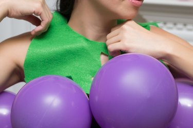 Add grape leaves to complete the grape bunch costume
