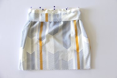 Sew knit waistband to pencil skirt