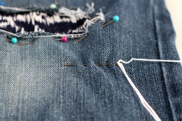 load the needle with multiple stitches