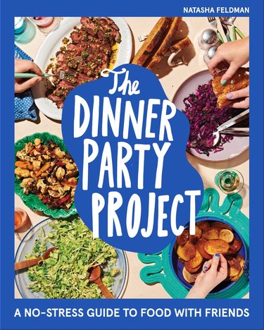 Book cover for "The Dinner Party Project" with a navy blue border, white lettering and various food items pictured