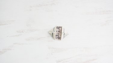 Folding corners of bill