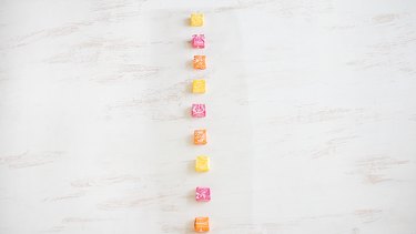 Candy lined up on cellophane