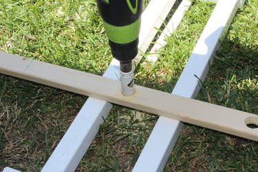 Hole-saw making room for PVC.