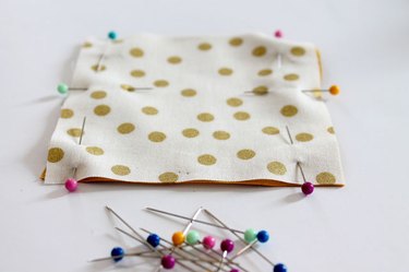 Pin squares wrong sides together.