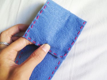 Gauging where to cut the slit on the flap of the DIY felt pencil case