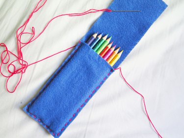 The sewn sides of the DIY felt pencil case
