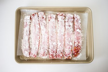 Stips of Turkish delight coated with powdered sugar.