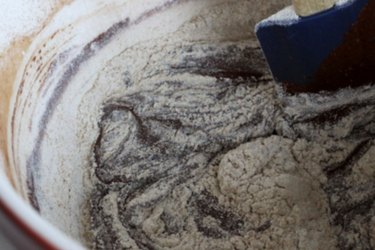 mixing healthy brownie batter