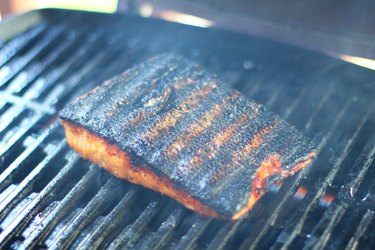 Salmon on a grill with char marks