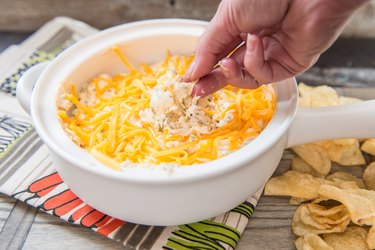 Cheeseburger Dip in a bowl served with chips