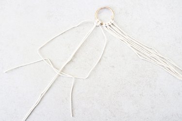 Insert the left strand of cord