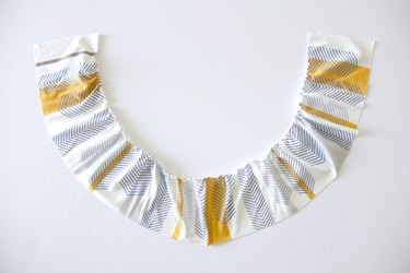 Sew a gathering stitch along the top of your ruffle