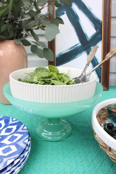 Layer ice in a footed bowl and place a serving bowl on top.