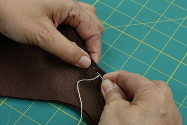 Hand stitch around one side of each antler.
