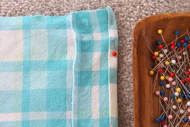Press, pin and sew the sides of the shirt