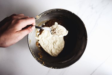 Add the dry ingredients into the batter after the liquid ingredients.