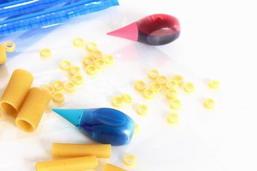 dried pasta + food coloring + bags