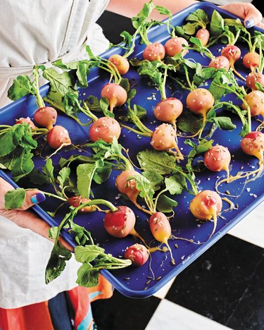 Blue platter of small radishes