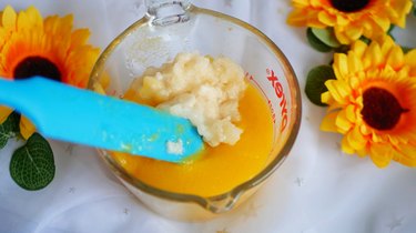 mixing gelatin and blended fruits together