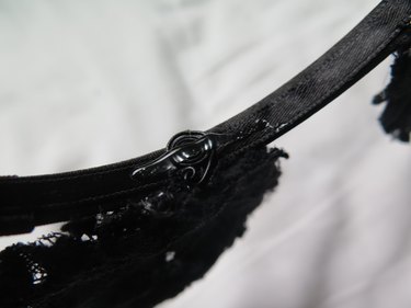 Hot glue on the coil and bottom of the headband.