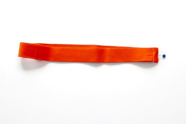 Sew elastic ends together