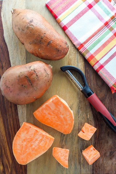 Preparing the sweet potatoes.